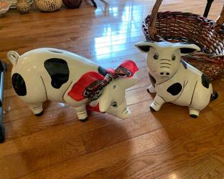 #132 pair of black and white ceramic pig banks 35 $35.00