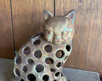 #115 iron cat candle holder 8.5 tall $20.00