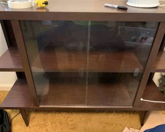 #75 midcentury glass door slide shelf 44x13x33 $75.00