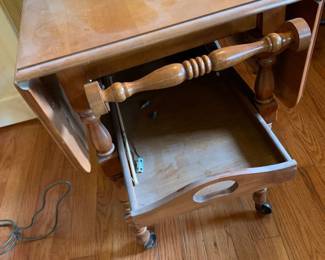 #18 flip side tea cart on wheels 28x19-40x29 $120.00