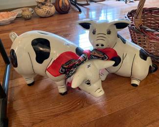 #132 pair of black and white ceramic pig banks 35 $35.00