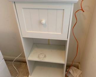 #100 white cabinet with 1 drawer and shelves 16x10x35 $20.00