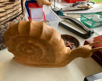 #112 wood snail 16 inch tall $20.00