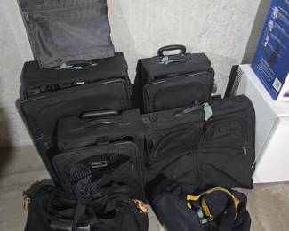 Seven piece TUMI luggage $75