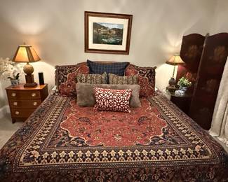 Vintage leather tufted King bed with Ralph Lauren bedding