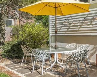 Outdoor dining table, 6 chairs and umbrella