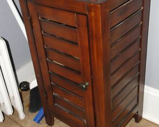 Storage cabinet for bath or laundry room