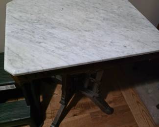 Marble top Victorian wooden table.