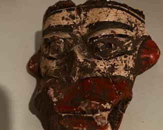 Pre-Columbian or Mayan artifacts with small terracotta figurines and vessel