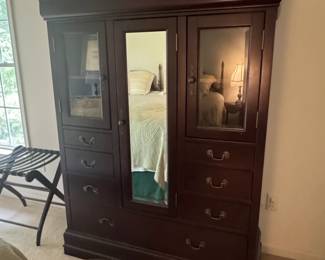 Pre-Sale Item. Call/text 540-792-1914 to set up an appointment. Dark Wood Armoire with Mirror and Glass Doors