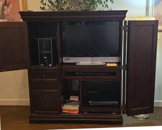 Dark Wood Entertainment Armoire with Integrated Computer Desk Features