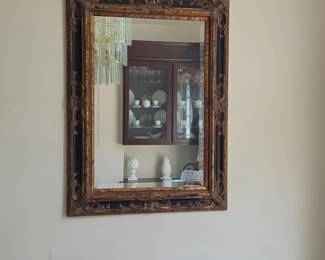 Ornate Gilt and Black Hollywood Regency Style Mirror