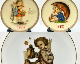 (3) Hummel Collector Plates 1982 Hummel 12th Annual Plate, titled "Umbrella Girl" and manufactured by Goebel in Germany Goebel M.J. Hummel Annual Collector Plate from 1980 school girl Reutter Porzellan M.J. Hummel "Guiding Angel" collector plate
