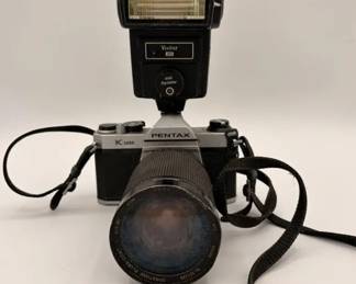 Pentax K1000 35mm SLR Film Camera with a Vivitar 283 Flash Unit