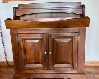 Pine dry sink cabinet features a raised backsplash, copper-lined tray