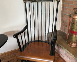 vintage Nichols & Stone Hitchcock-style rocking chair featuring a black finish with gold stenciling