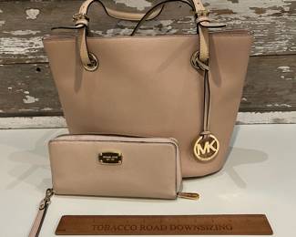 M21 - $60. MK Michael Kors Bucket Purse w/ matching wallet. Great condition. Clean inside. Measures 14" x 6.5" x 10" tall.