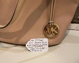 M21 - $60. MK Michael Kors Bucket Purse w/ matching wallet. Great condition. Clean inside. Measures 14" x 6.5" x 10" tall.