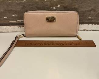 M21 - $60. MK Michael Kors Bucket Purse w/ matching wallet. Great condition. Clean inside. Measures 14" x 6.5" x 10" tall.