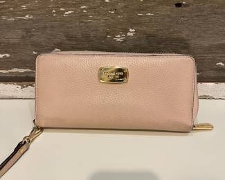 M21 - $60. MK Michael Kors Bucket Purse w/ matching wallet. Great condition. Clean inside. Measures 14" x 6.5" x 10" tall.