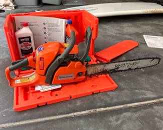 M8 - $275. Husqvarna 450 Rancher Chainsaw. Comes in storage case. Pulls easily.