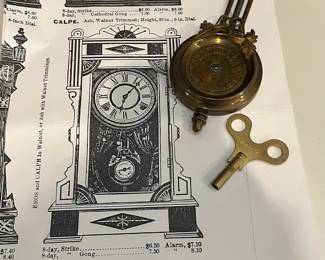 M20 - $75. Antique Gilbert Calpe Mantle Clock. Measures 12" x 19.75" tall. Untested.