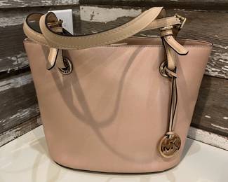 M21 - $60. MK Michael Kors Bucket Purse w/ matching wallet. Great condition. Clean inside. Measures 14" x 6.5" x 10" tall.