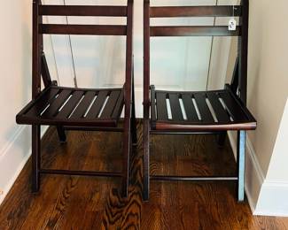 M35 - $25 PAIR of wooden folding chairs. Both sturdy and in good condition.