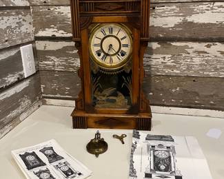 M20 - $75. Antique Gilbert Calpe Mantle Clock. Measures 12" x 19.75" tall. Untested.