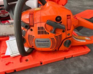M8 - $275. Husqvarna 450 Rancher Chainsaw. Comes in storage case. Pulls easily.