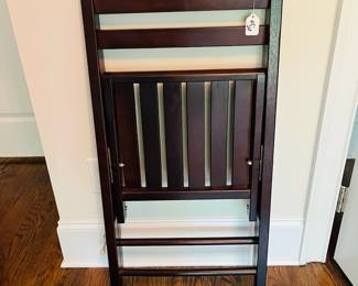 M35 - $25 PAIR of wooden folding chairs. Both sturdy and in good condition.