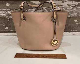 M21 - $60. MK Michael Kors Bucket Purse w/ matching wallet. Great condition. Clean inside. Measures 14" x 6.5" x 10" tall.