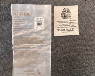 M15 - $150. West Elm Sketch Rug. 100% wool. Measures 6' round. Clean, no issues noted.