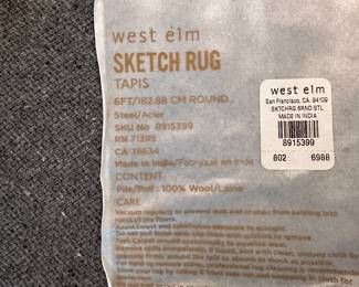 M15 - $150. West Elm Sketch Rug. 100% wool. Measures 6' round. Clean, no issues noted.