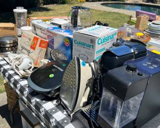 Home kitchen appliances including George Forman Grill, Waffle Iron, Crepe maker, several coffee makers and Cuisinarts