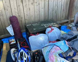 Camping gear including tents, sleeping bags, chairs