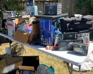 Electronics including vintage fans, heaters, cam corder, several cameras, VCR, DVD players