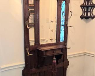 Antique carved wooden mirrored hall tree