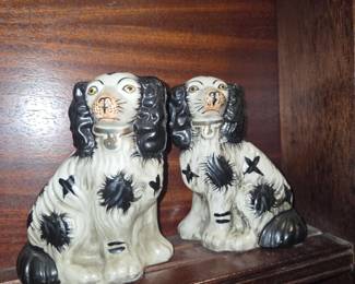 Black and white spaniel dog figurines