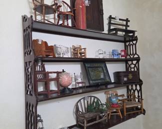 Wooden display wall shelf. Mini chairs, rocking chairs, benches