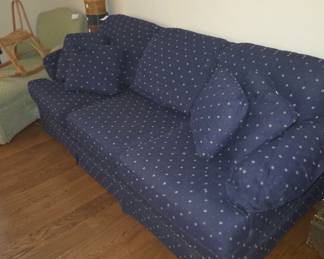 Blue upholstered sofa couch