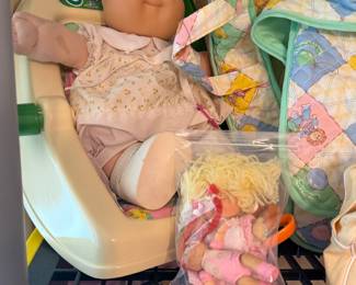 Cabbage Patch Kids Doll and car seat carrier; tiny Cabbage Patch Kids;