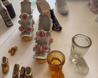 Ceramic, glass and brass tiny shoes