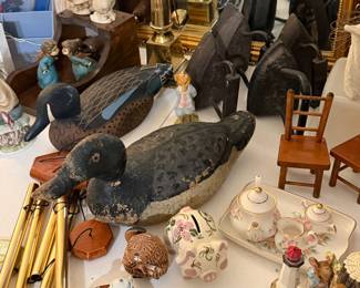 Vintage duck decoys; cast iron sad irons; vintage hand painted piggy bank