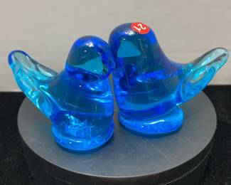 2 blue glass birds
