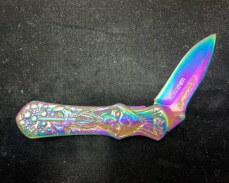 Rainbow folding knife skull