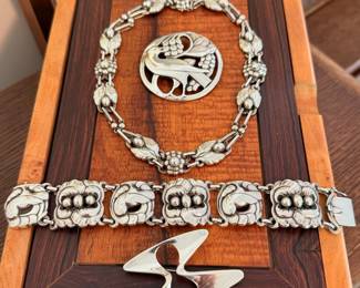 Selection of vintage Georg Jensen sterling jewelry pieces, including a sterling neckace No.1 and sterling Dove bracelet No. 32