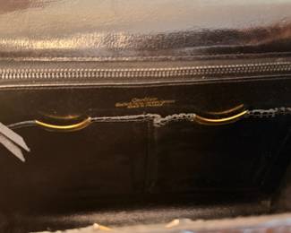Incredible and rare Cartier handbag ca. 1930’s.  with 18kt gold hardware throughout and one small ruby on clasp.  The gold hardware and ruby have been tested by a renowned local Jeweler