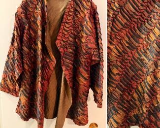 An incredible collection of hand signed Art-to-Wear pieces by local MN artist Tim Harding