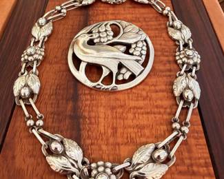 Selection of vintage Georg Jensen sterling jewelry pieces, including a sterling neckace No.1 and sterling Dove bracelet No. 32
